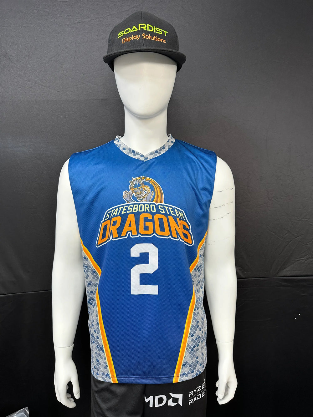 Custom blue Statesboro Steam Dragons basketball jersey with number 2 on a mannequin