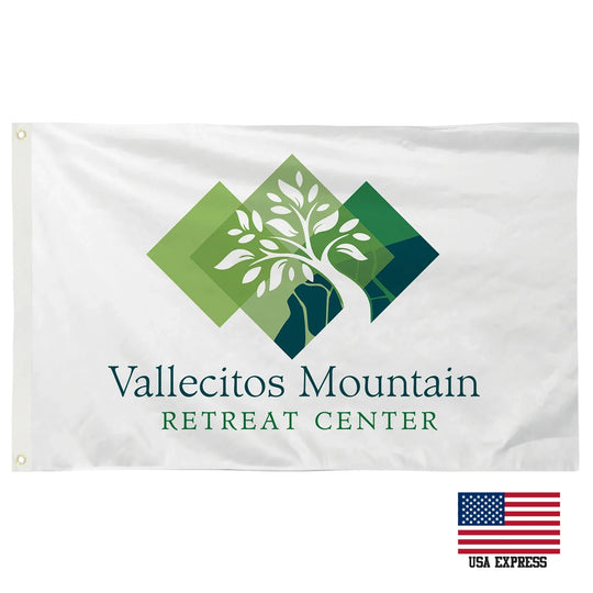 Custom white flag with Vallecitos Mountain Retreat Center logo