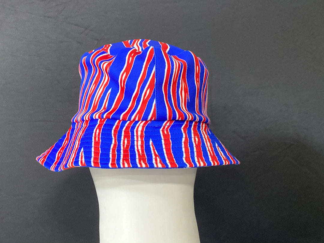 Blue, red, and white zebra-patterned bucket hat on a white mannequin head.