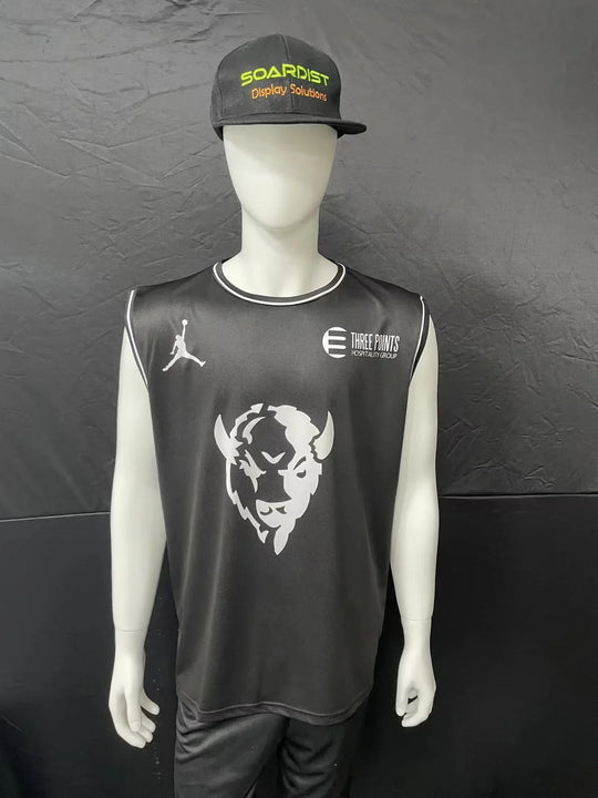 Mannequin wearing a custom black athletic jersey and matching baseball cap.
