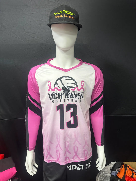 Custom pink and white Loch Raven Volleyball jersey with number 13 on a mannequin