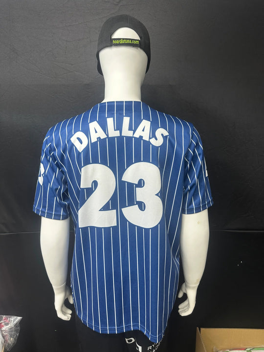 Back view of a blue pinstripe baseball jersey with 'DALLAS 23' in white lettering.