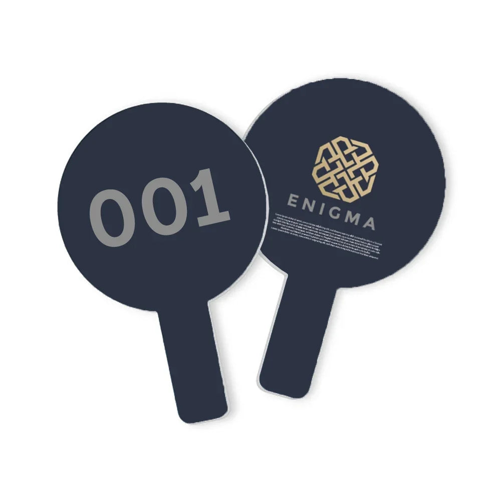 Two navy blue paddle-shaped promotional items, one with '001' and one with 'ENIGMA' logo.