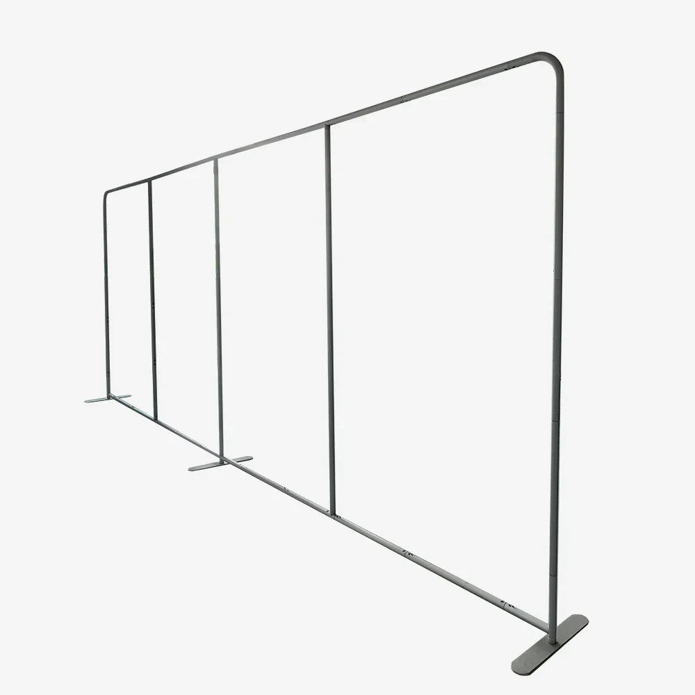 Three connected silver metal crowd control barriers with flat feet