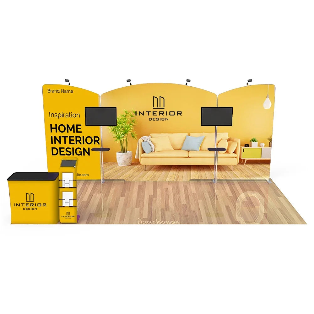 Custom branded trade show display with curved backdrop, counters, and monitor stands