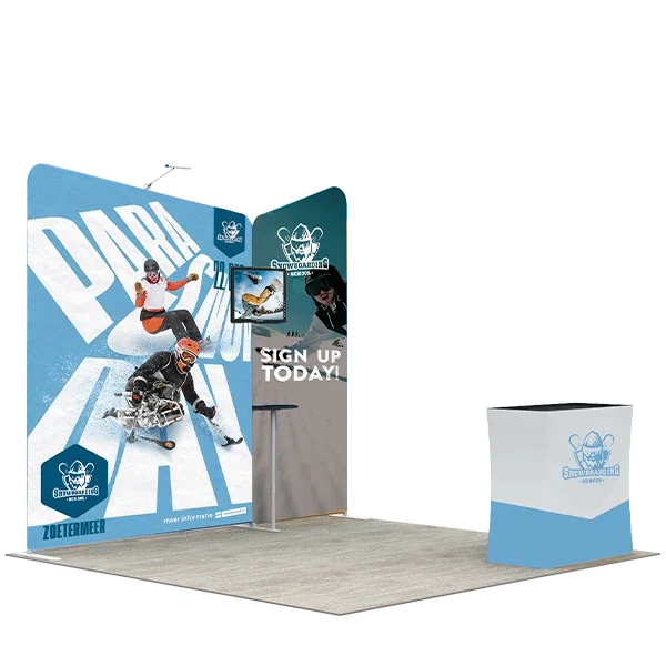 Custom branded trade show booth with banners and a matching table cover for snowboarding.
