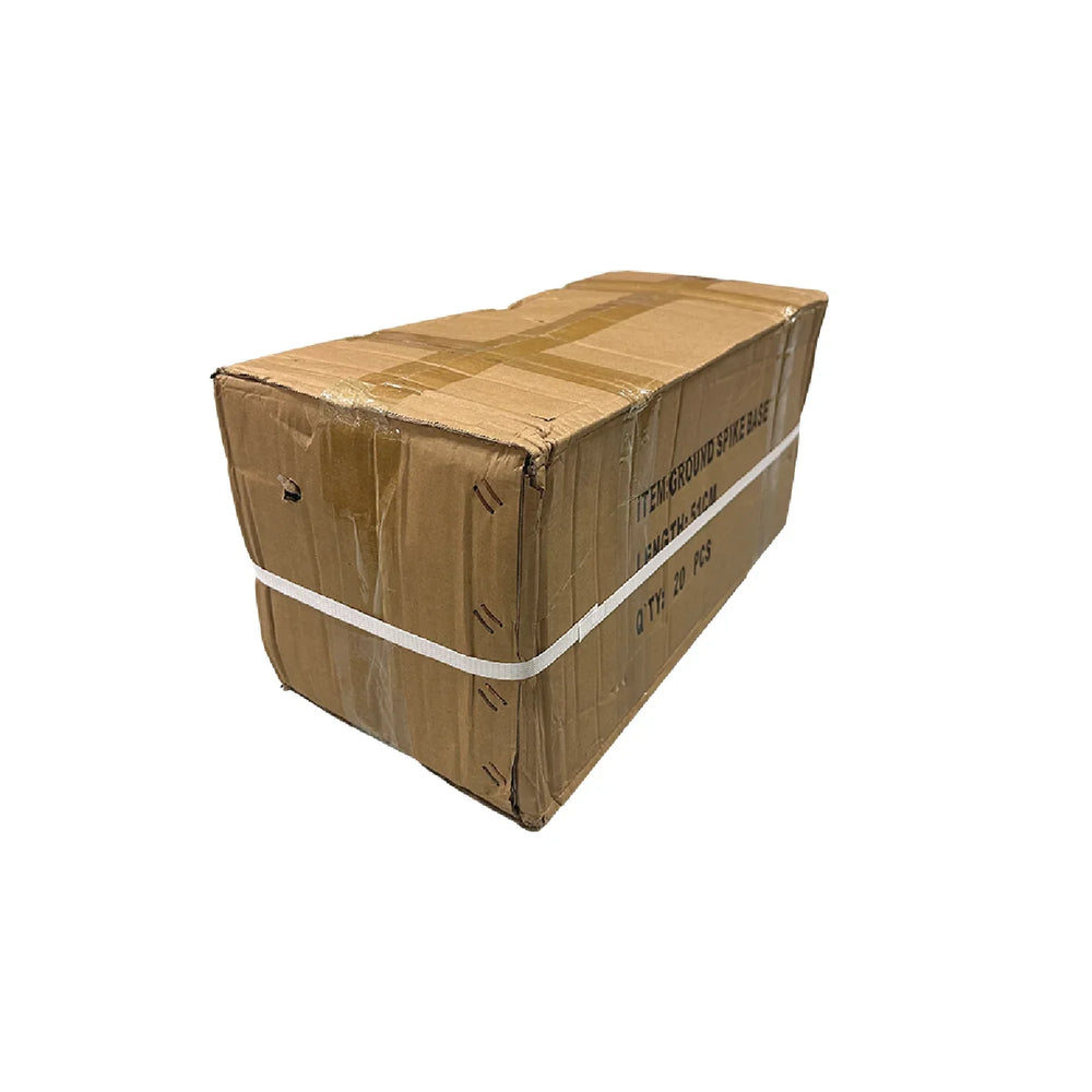 Cardboard shipping box labeled ground spike base with plastic strapping