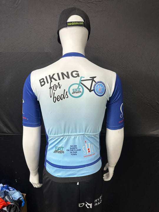 Back view of a custom cycling jersey with Biking for Beds logo and graphics.
