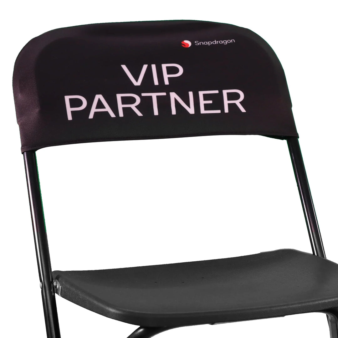 Black custom chair cover with white VIP PARTNER text and Snapdragon logo
