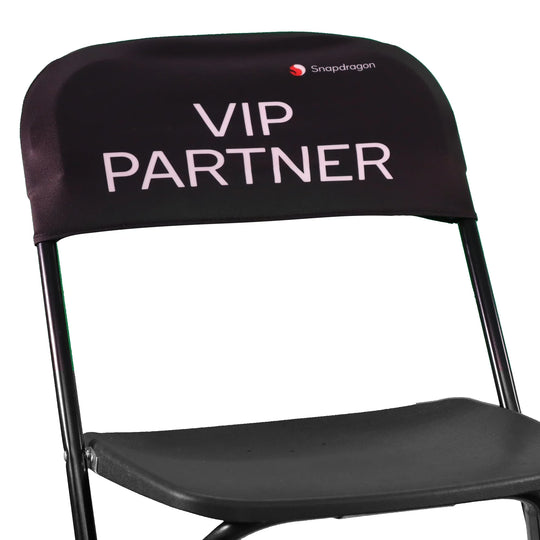 Black custom chair cover with white VIP PARTNER text and Snapdragon logo