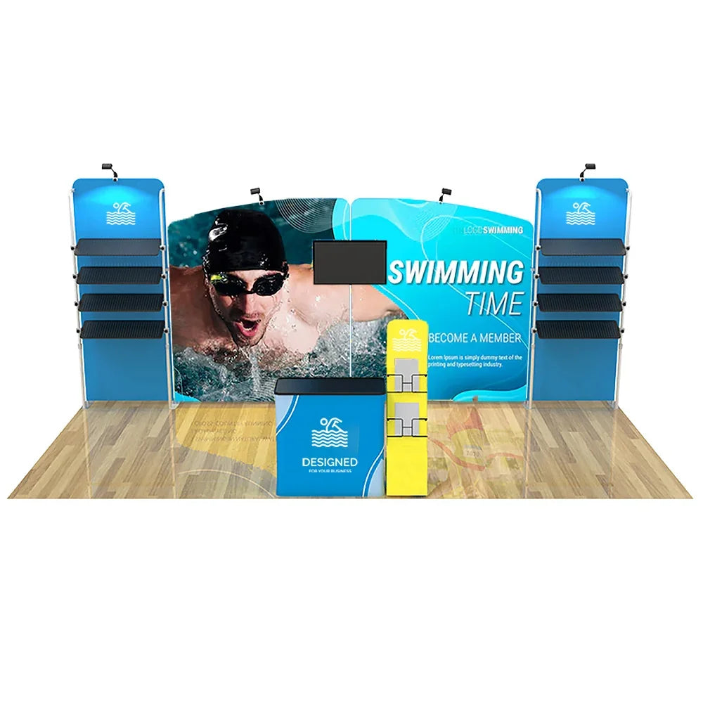 Custom swimming themed trade show booth display with backdrop, counter, and shelving units