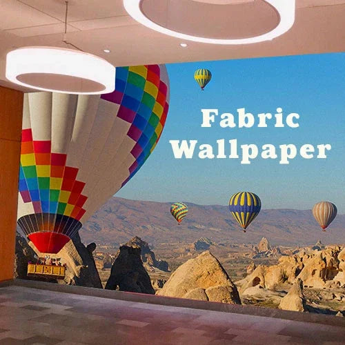 Custom fabric wallpaper featuring colorful hot air balloons over a rocky landscape