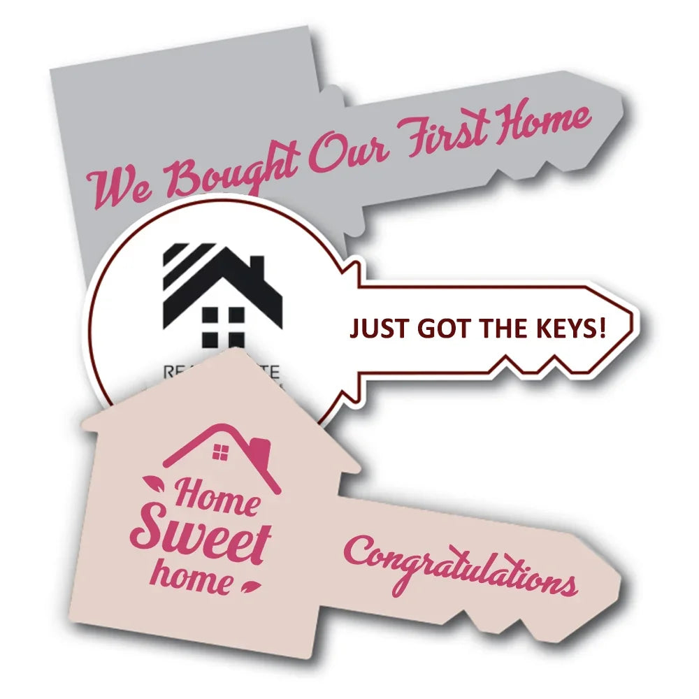 Three key-shaped custom stickers with new home celebration messages and a house icon.