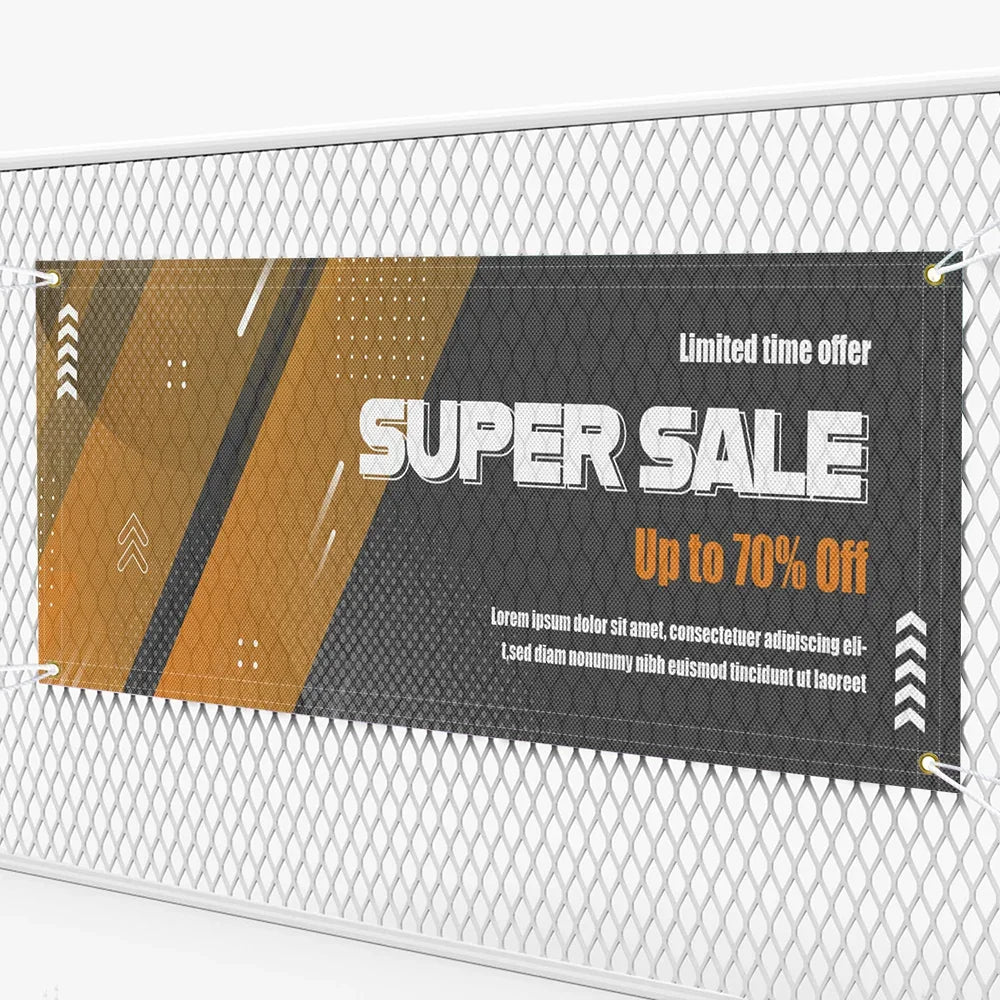 Custom mesh banner advertising a super sale with up to 70% off, mounted on a metal fence.