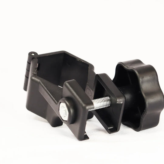 Black plastic adjustable clamp with a star-shaped tightening knob