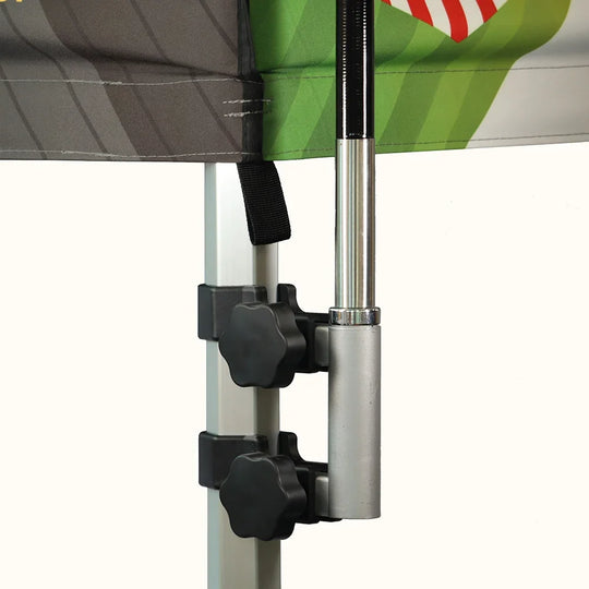 Close-up of an adjustable metal leg joint and locking knob on a custom popup tent frame