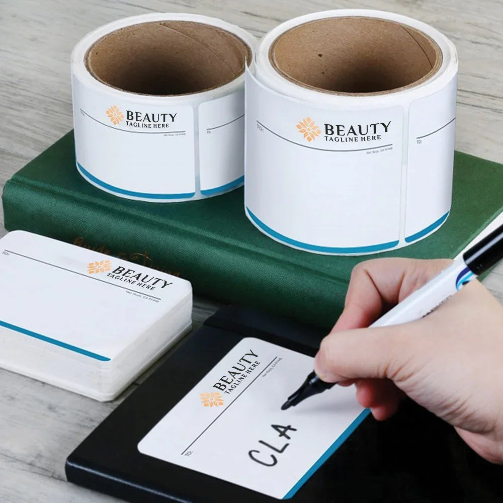 Custom printed adhesive labels on rolls and sheets with a person writing on one