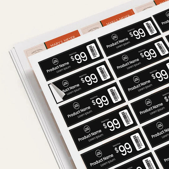 Sheet of black custom product price labels with white text and barcodes.