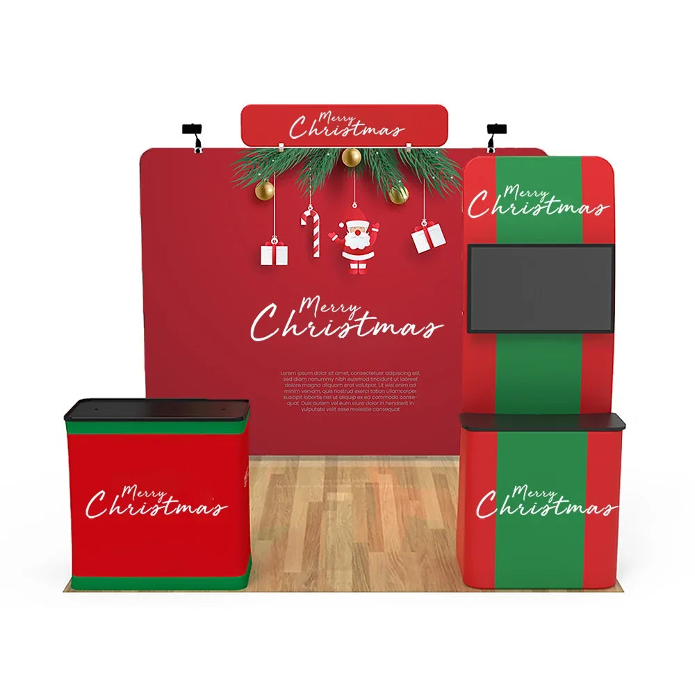 Custom red Christmas themed event backdrop with matching branded table covers