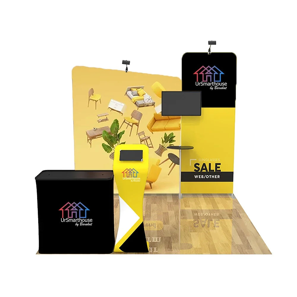 Custom trade show booth display with banners, podium, and counter in yellow and black.