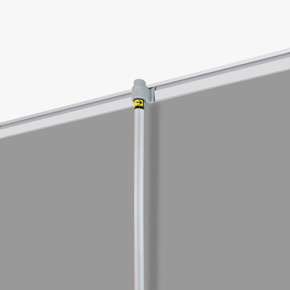 Close-up of a silver metal support pole connecting to a white frame for a custom tent or banner.