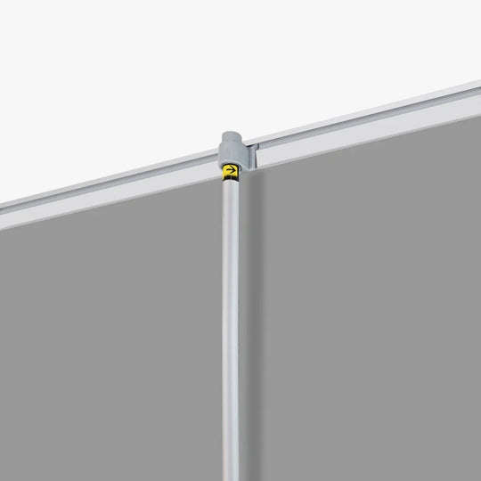 Close-up of a silver metal support pole connecting to a white frame for a custom tent or banner.
