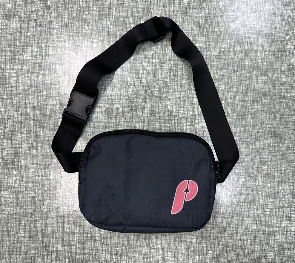 Black crossbody shoulder bag with a pink stylized letter P logo