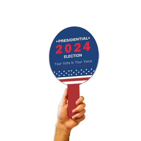 Hand holding a circular 2024 Presidential Election campaign sign