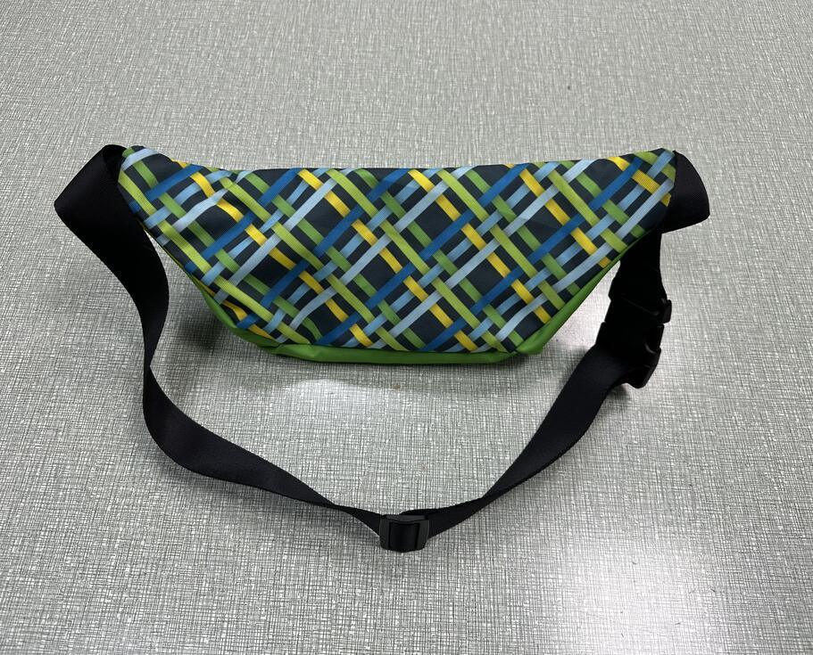 Colorful geometric pattern waist bag with black adjustable strap