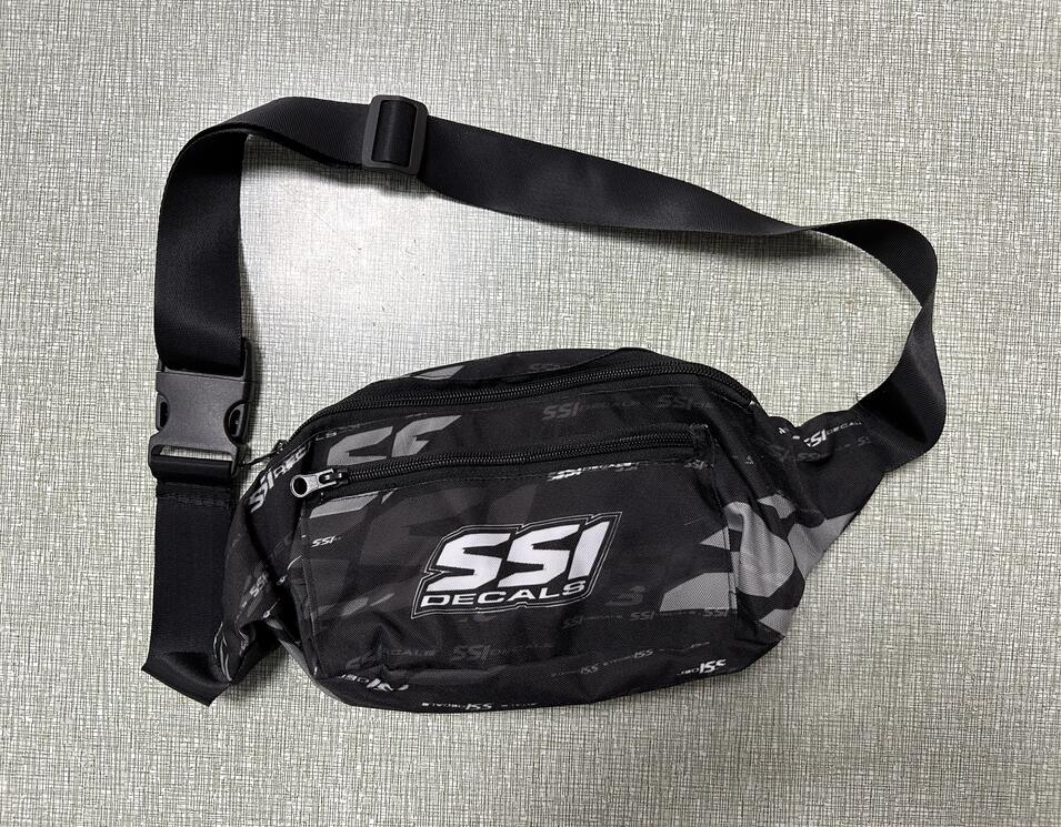 Black and grey camouflage waist bag with SSI Decals logo and adjustable shoulder strap