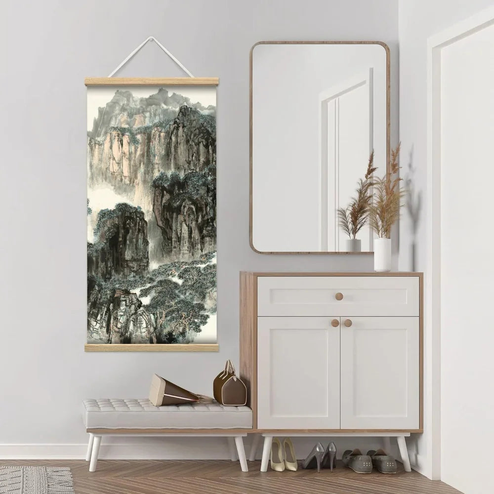 Traditional Chinese landscape painting scroll hanging in a modern minimalist room