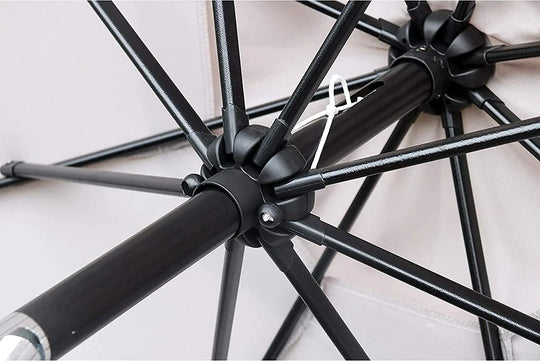 Close-up of the black metal frame and rib structure of a custom tent canopy