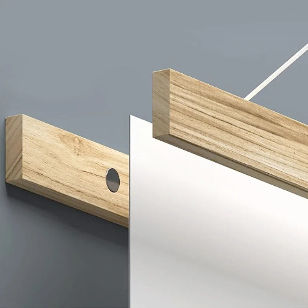 Close-up of a white banner attached to light-colored wooden support poles.