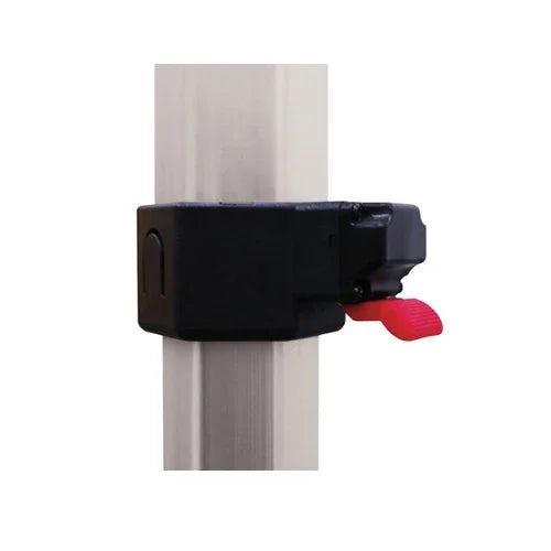 Close-up of a black plastic tent pole clip with a red locking tab