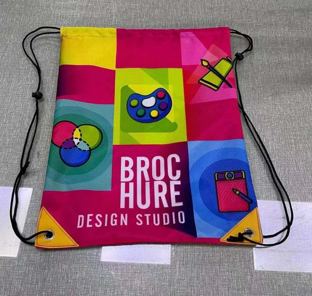 Colorful custom drawstring bag for Brocure Design Studio with art-themed graphics.