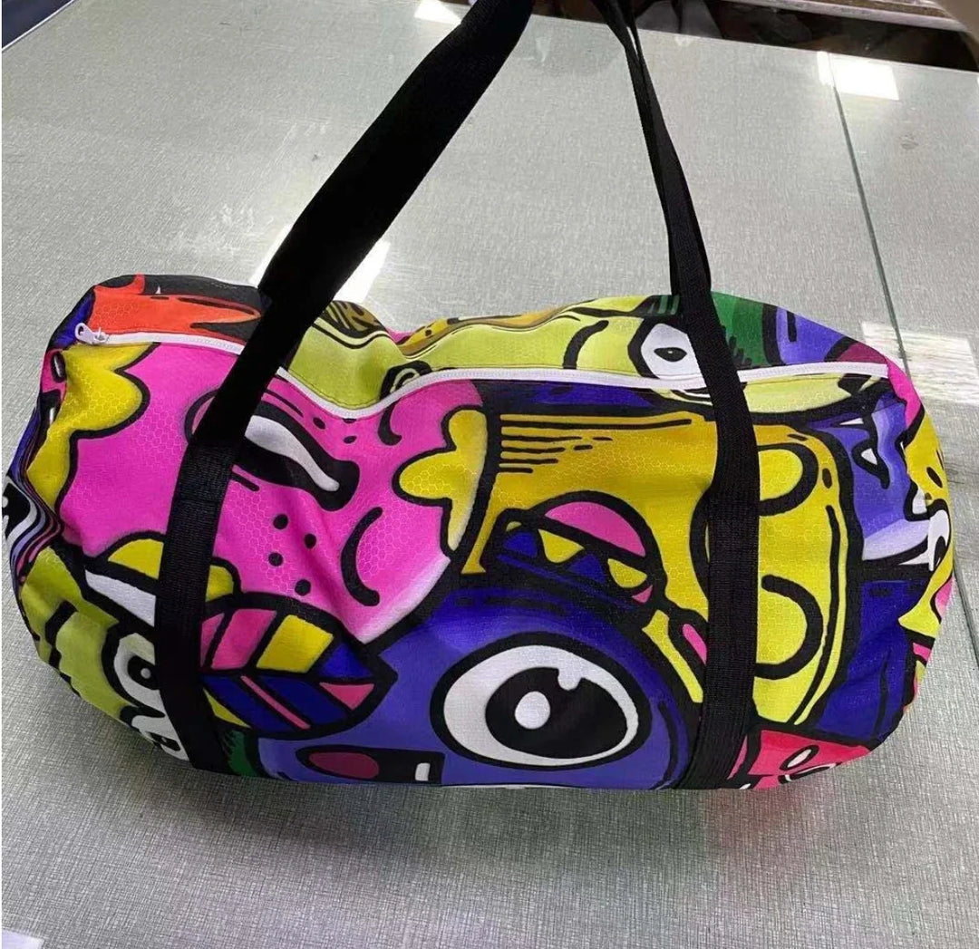 Colorful custom printed duffel bag with psychedelic graphic art and black straps