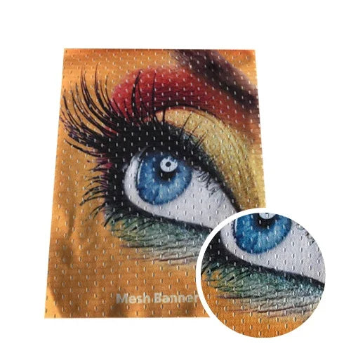 Close-up of a custom printed mesh banner featuring a detailed eye design.